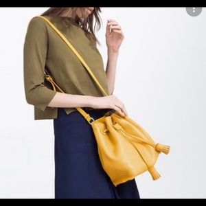 Zara Tasselled Bucket Bag In Mustard
Yellow